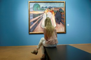 A-visitor-looks-at-a-painting-The-ladies-on-the-bridge-on-May-31-2013-at-the-National-Gallery-in-Oslo